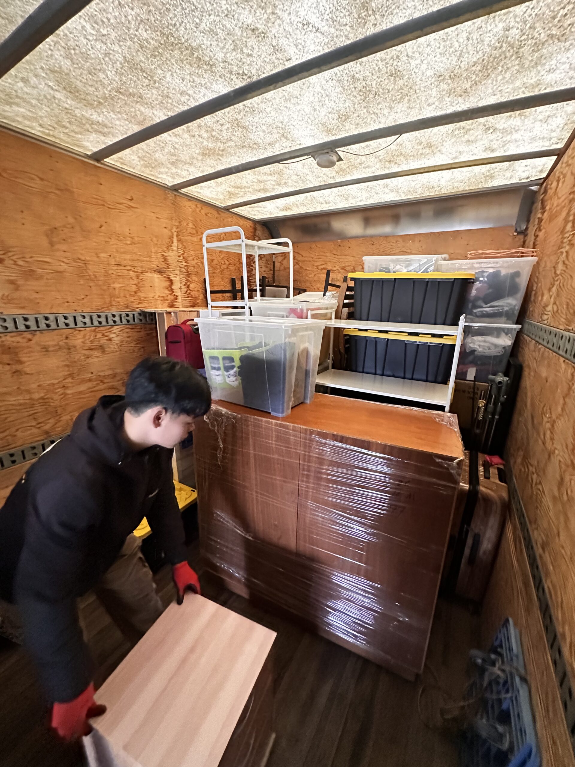 Moving truck loaded with furniture and boxes during residential moving service